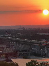 High angle view of buildings at sunset