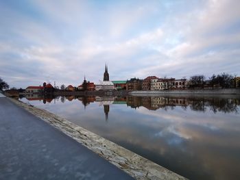 Reflection of building on river