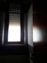 Sunlight falling on wall in building
