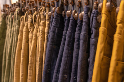 Clothes hanging on rack at store