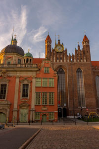 Facade of historic building against sky