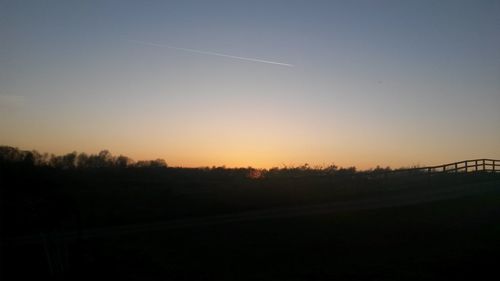 Scenic view of landscape at sunset