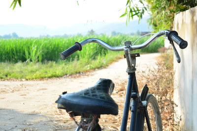 Bicycle parked on field