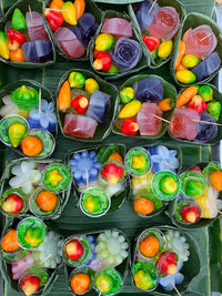 High angle view of multi colored candies on display