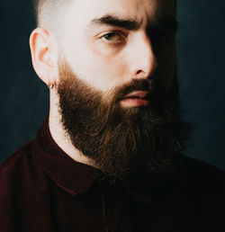 Close-up of young man looking away