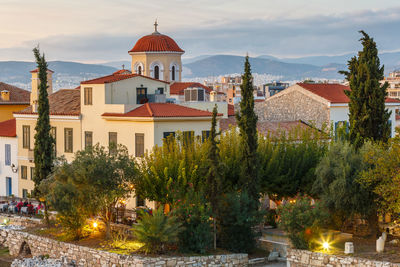 Church and neoclassical buildings in the old town of athens, greece.