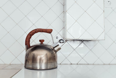 Close-up of kettle in kitchen