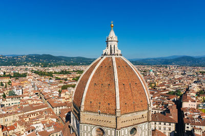 Aerial panoramic view of dome of santa marial del fiore basilica with historic buildings
