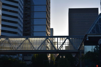 Low angle view of modern building against clear sky