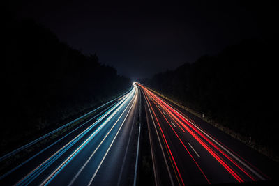 High angle view of light trails on highway