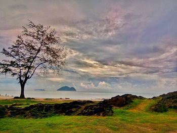 Scenic view of sea against sky at sunset