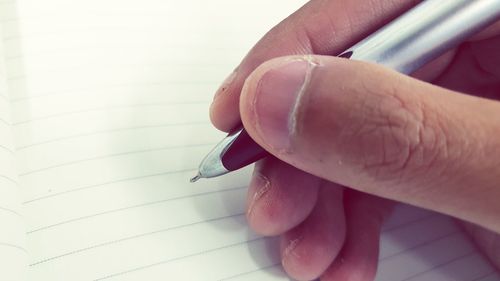 Close-up of woman holding hands