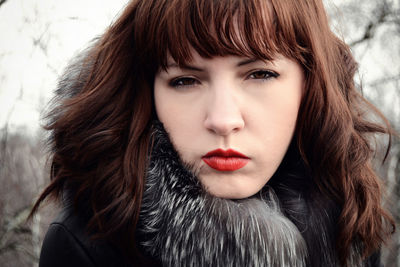 Portrait of beautiful woman wearing fur jacket