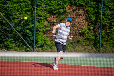 Full length of a boy running