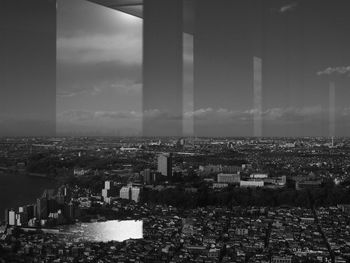 High angle view of buildings in city against sky