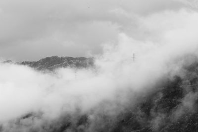 Scenic view of fog against sky