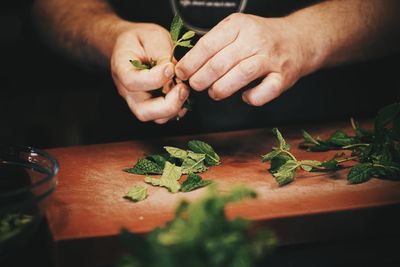 Close-up of hands on table