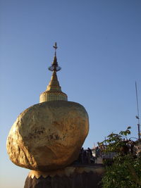 View of temple against clear blue sky