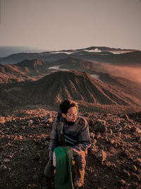 Being at the top of mount mahameru which is very cold, but has a good view.