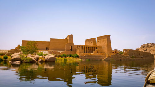 Reflection of temple in the nile in egypt