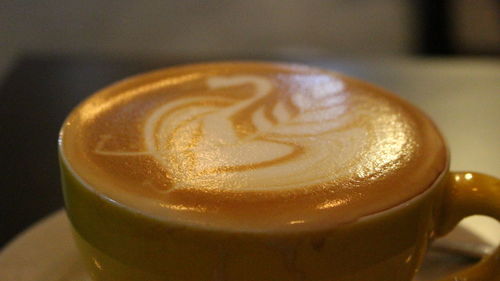 Close-up of cappuccino on table