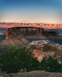 Scenic view of rock formations at sunset