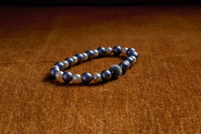 High angle view of necklace on table