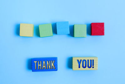 Close-up of toys against blue background