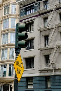 Road signal against building 