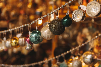 Close-up of decorations hanging in market