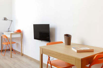 Empty chairs and table at home