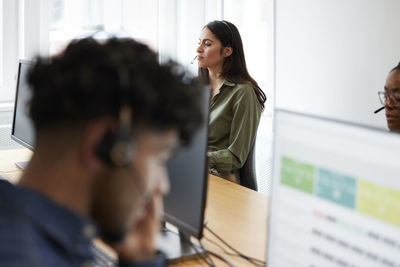 Diverse call center employees at work