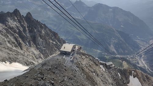 High angle view of overhead cable car over mountains