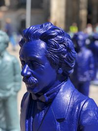 Close-up of statue against blue background