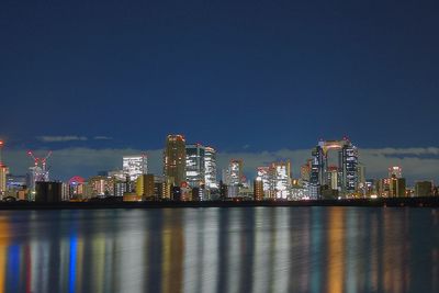 Illuminated cityscape at night