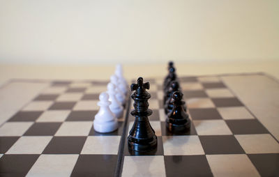 Close-up of chess pieces on board