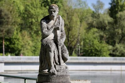 Statue against trees at hochablass augsburg