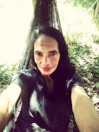 Portrait of smiling young woman