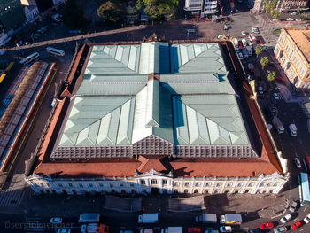 High angle view of street amidst buildings in city