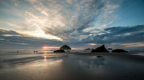 Scenic view of sea against sky during sunset