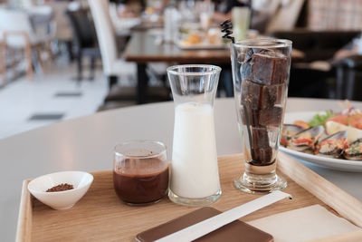 Close-up of beer glass on table at restaurant