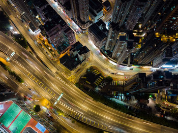 High angle view of illuminated cityscape at night