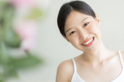 Portrait of smiling young woman 