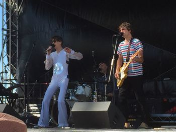 Full length of young man playing guitar