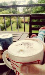 Close-up of coffee cup on table