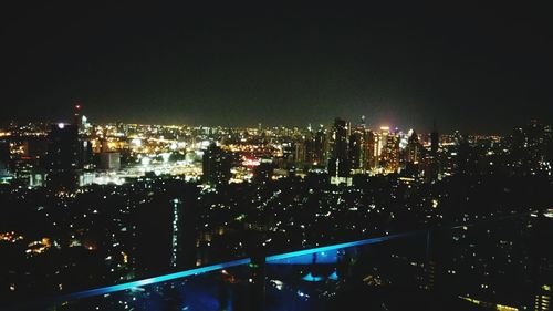 Illuminated cityscape at night