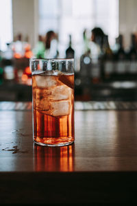 Close-up of beer in glass on table