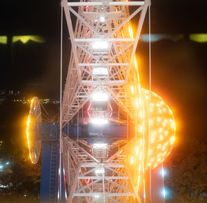 Digital composite image of illuminated street lights at night