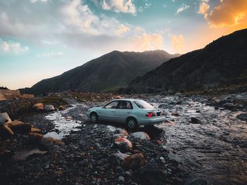 Scenic view of mountains against sky during sunset