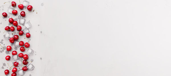 High angle view of strawberry over white background